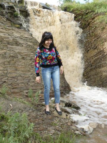 Біля водограю